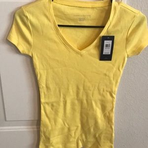 Tommy Hilfiger XXS fitted yellow v neck shirt